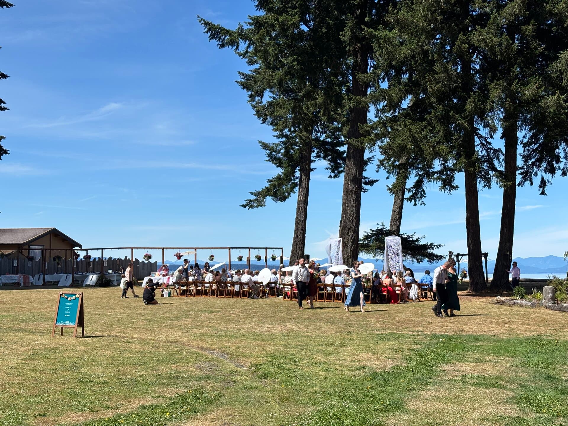 Event lawn setup with mountain and ocean views