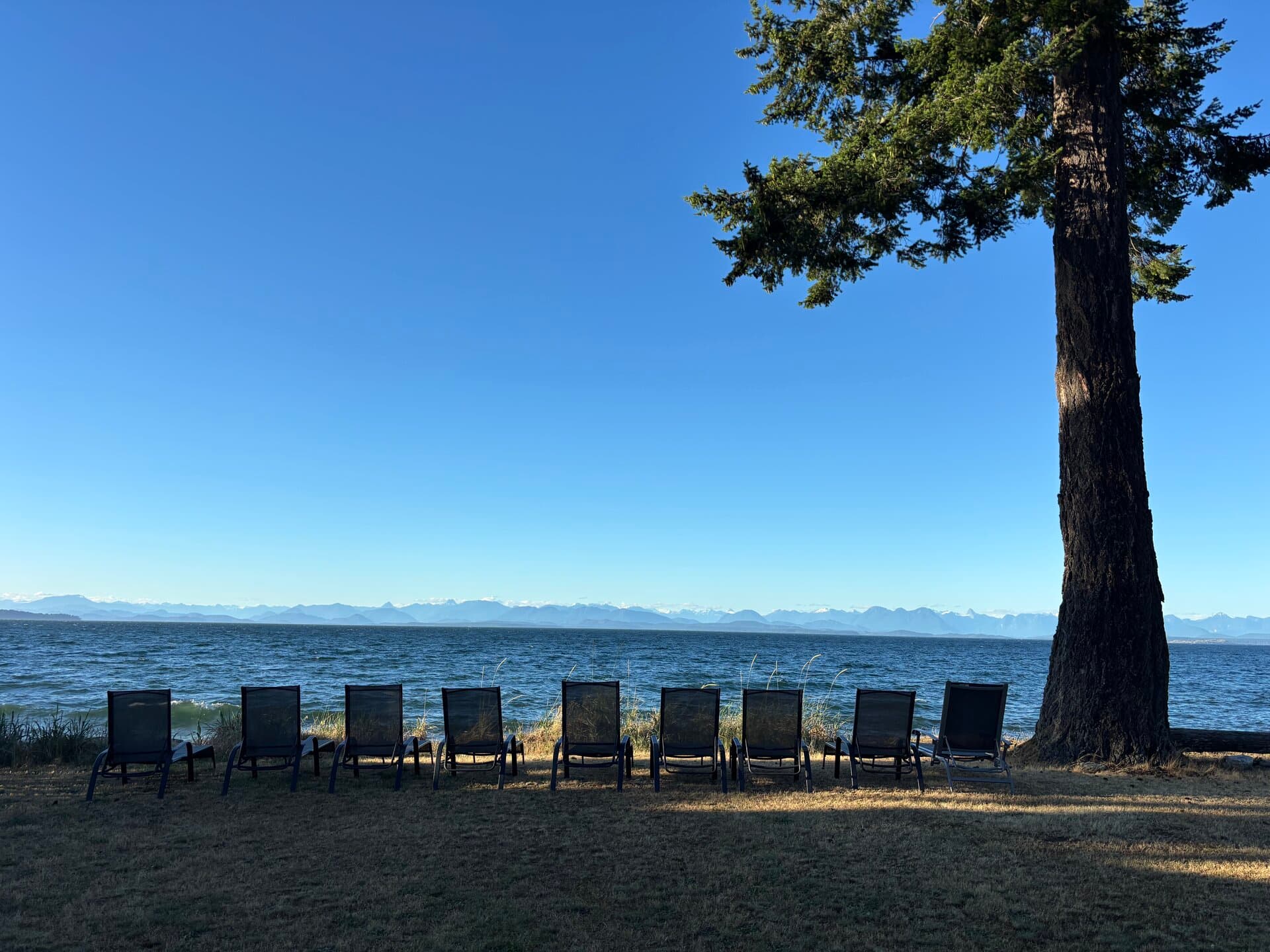 Resort property view with coastal scenery