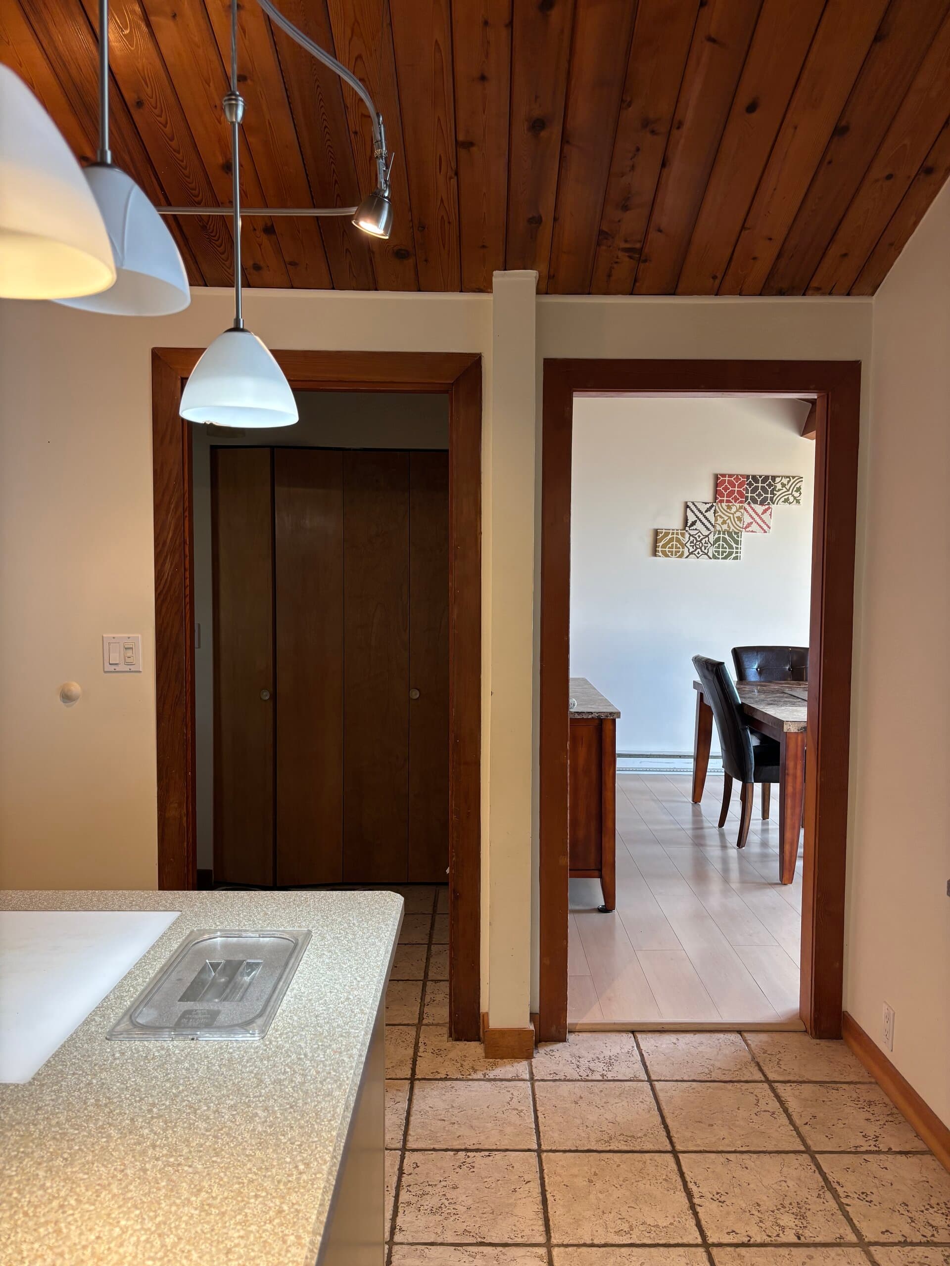 Bedroom and kitchen adjacent views