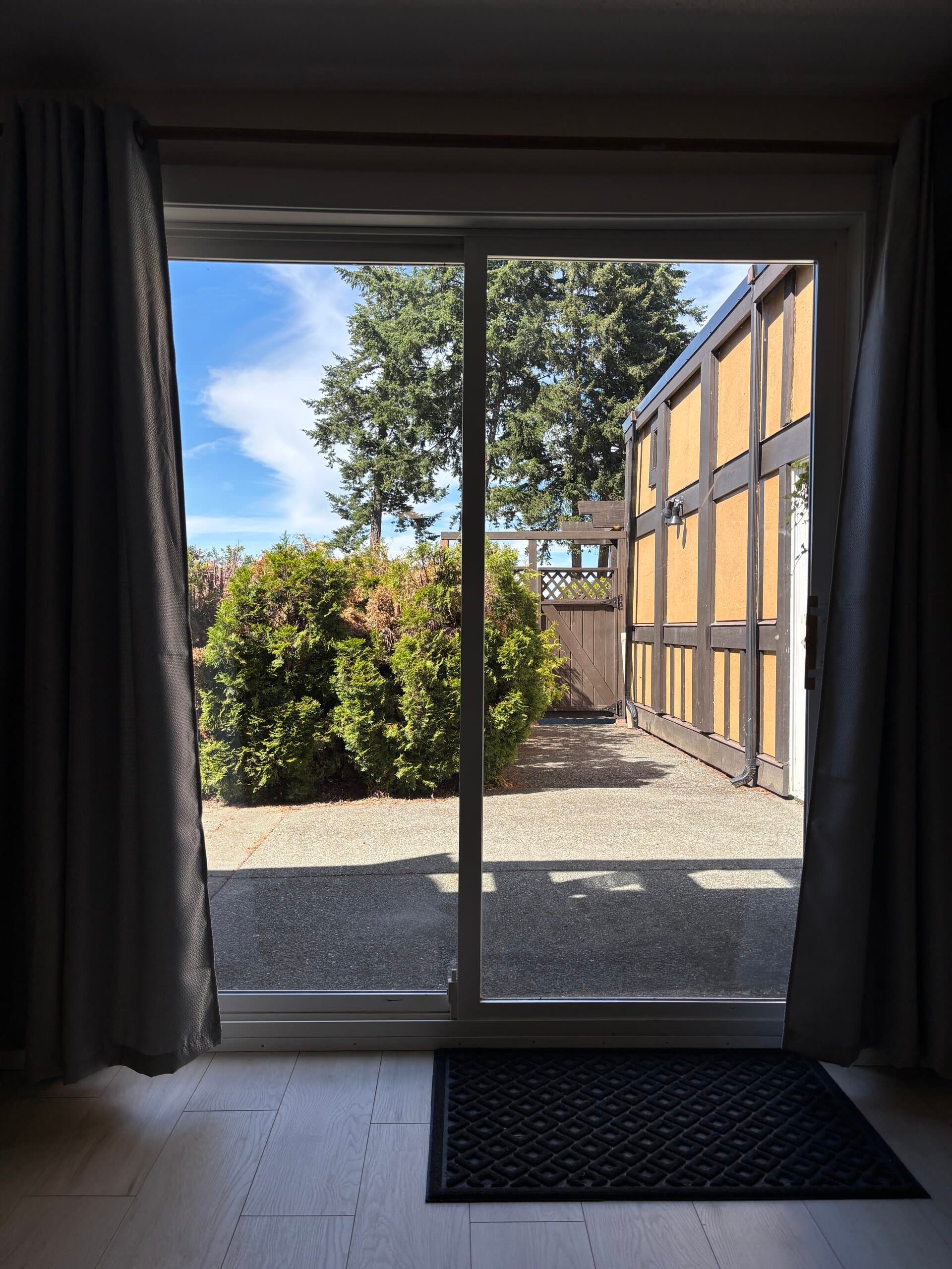 Garden patio viewed through the suite's sliding glass door